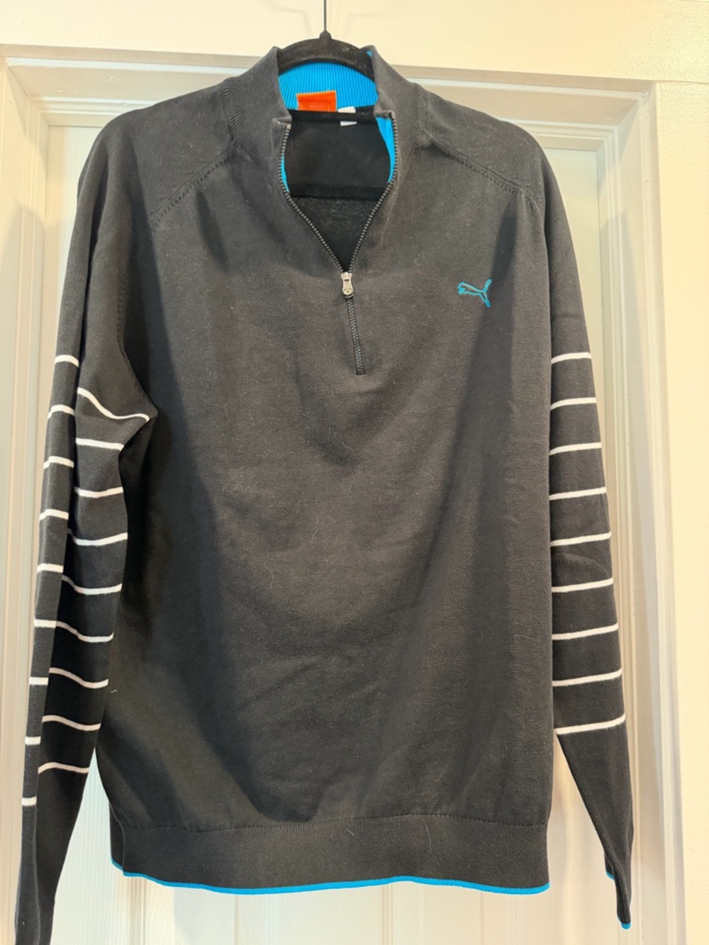 Puma Men's Black Golf Quarter Zip with Blue Trim and White Sleeve Stripes